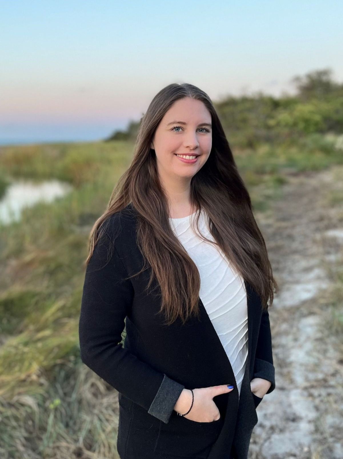 Ashley Rittershaus, CFP®, TPCP® | Curious Crow Financial Planning